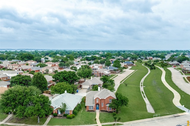 birds eye view of property with a residential view