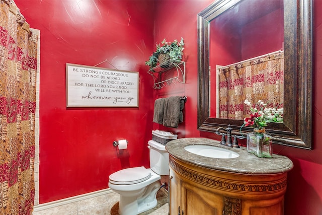 bathroom with vanity, tile patterned flooring, toilet, and a shower with curtain