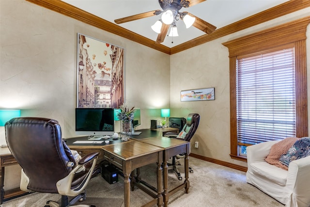 office space featuring ceiling fan, ornamental molding, baseboards, and carpet