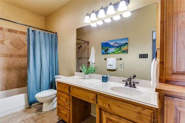 full bath with vanity, tile patterned floors, toilet, and shower / tub combo