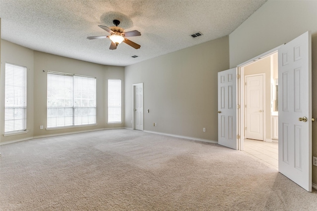 2310 Crest Park Dr, Arlington, TX 76006 - bathroom featuring crown molding, visible vents, a freestanding tub, baseboards, and a shower stall