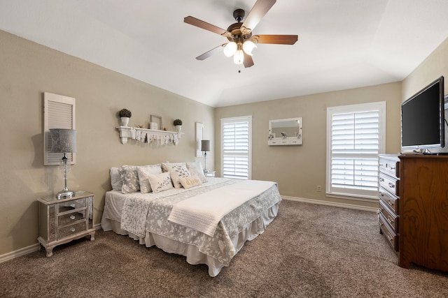 bedroom featuring baseboards, ceiling fan, and carpet flooring