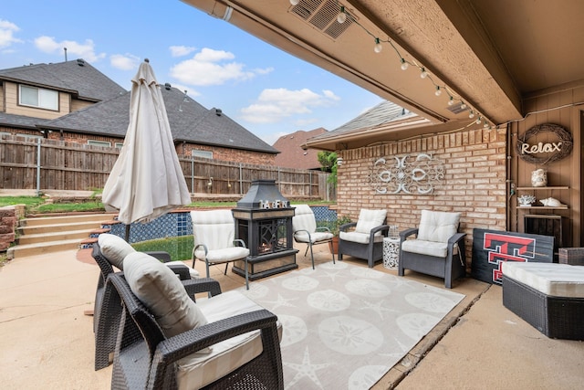 view of patio / terrace featuring a fenced backyard and outdoor lounge area