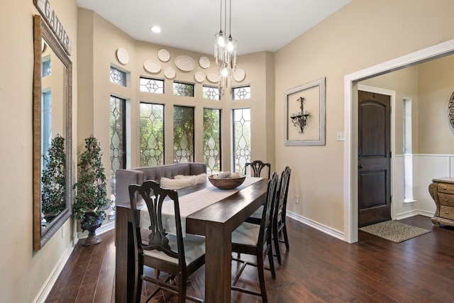 dining area featuring dark wood-style flooring, baseboards, and recessed lighting
