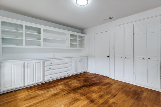 10119 Chisholm Trl, Dallas, TX 75243 - interior space featuring dark wood-style flooring