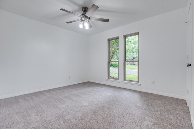 10119 Chisholm Trl, Dallas, TX 75243 - unfurnished room with carpet floors, baseboards, and a ceiling fan