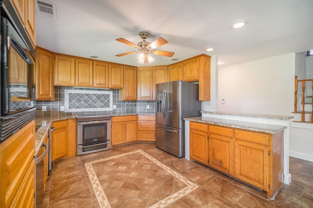 kitchen featuring ceiling fan, backsplash, a peninsula, stainless steel appliances, and recessed lighting