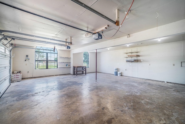 garage featuring a garage door opener