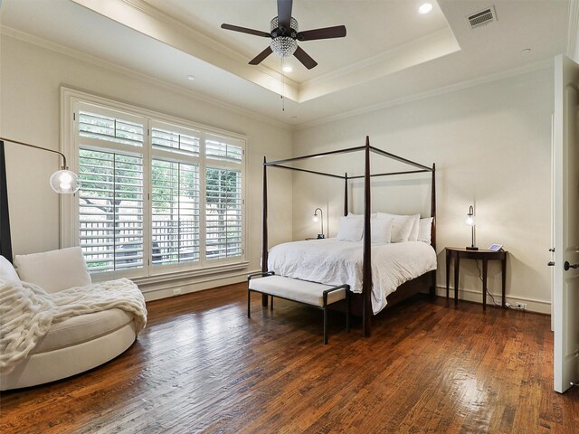 exercise area featuring crown molding, recessed lighting, and wood finished floors