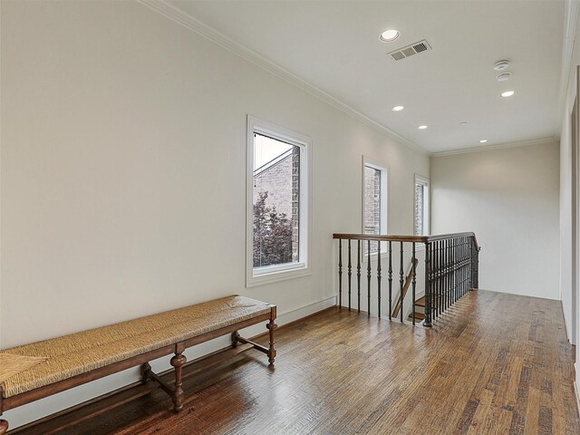 full bath with crown molding, vanity, baseboards, a bath, and a shower stall