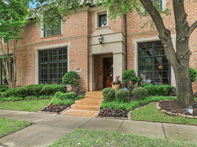 view of front of property with brick siding