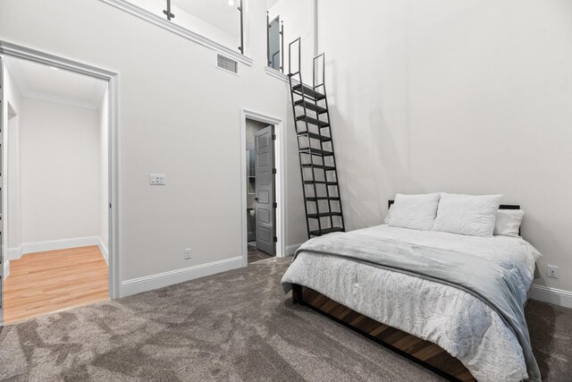 1002 Tokala St, Caddo Mills, TX 75135 - bedroom with crown molding, visible vents, baseboards, and carpet floors