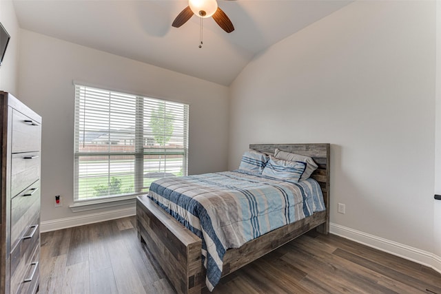 bedroom with dark wood-style flooring, baseboards, ceiling fan, and lofted ceiling