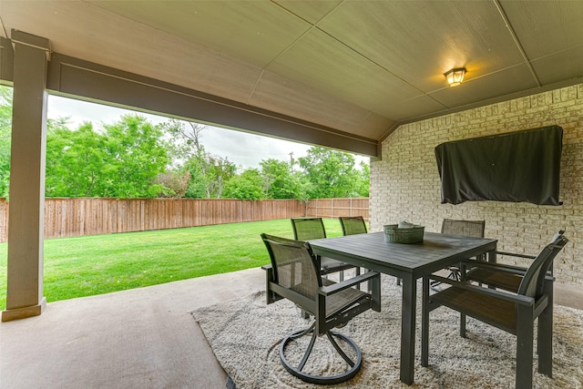 view of patio / terrace with outdoor dining area and a fenced backyard