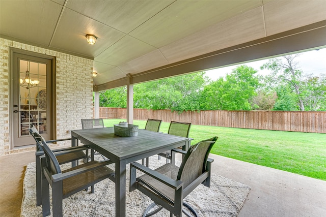 view of patio / terrace featuring outdoor dining space and a fenced backyard