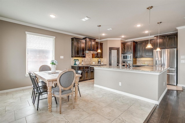 dining area with crown molding, recessed lighting, baseboards, and visible vents