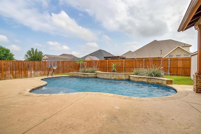 view of swimming pool with a fenced in pool, a fenced backyard, and a patio area