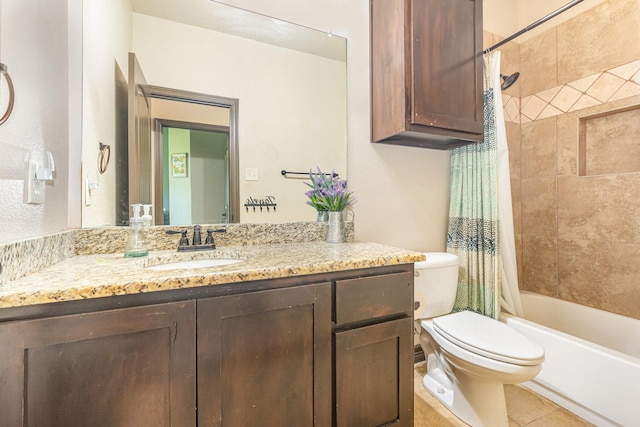 full bath featuring shower / bath combo with shower curtain, toilet, tile patterned flooring, and vanity
