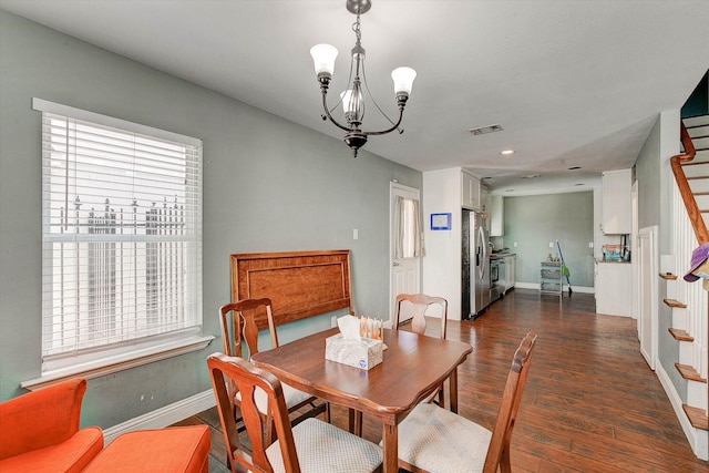 dining area with an inviting chandelier, recessed lighting, baseboards, dark wood-type flooring, and visible vents