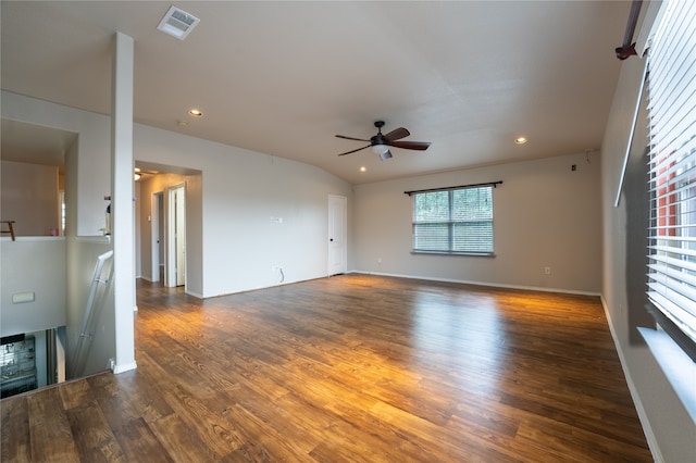 unfurnished room with ceiling fan, visible vents, vaulted ceiling, wood finished floors, and recessed lighting