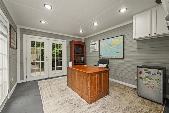 office space featuring french doors, wood walls, baseboards, concrete floors, and recessed lighting