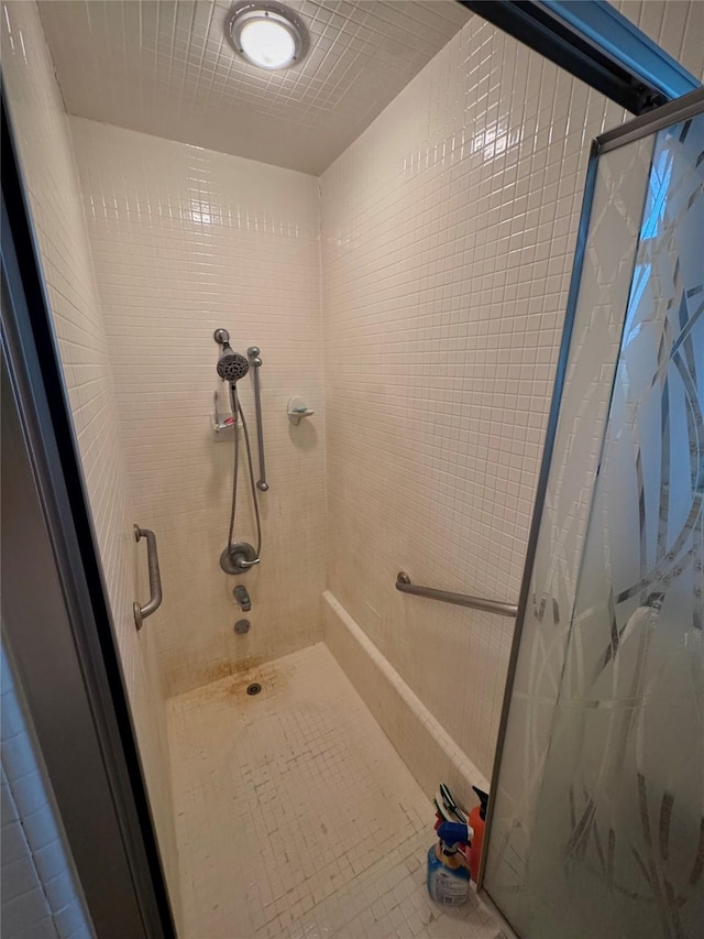 full bath featuring a stall shower