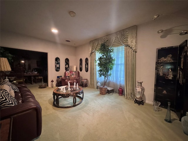 living area with carpet flooring