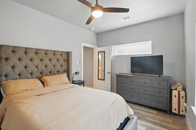 1933 Shaw St, Dallas, TX 75212 - bedroom featuring a ceiling fan, wood finished floors, and visible vents