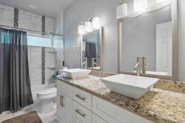 1933 Shaw St, Dallas, TX 75212 - full bathroom featuring shower / bath combo with shower curtain, a sink, double vanity, and toilet