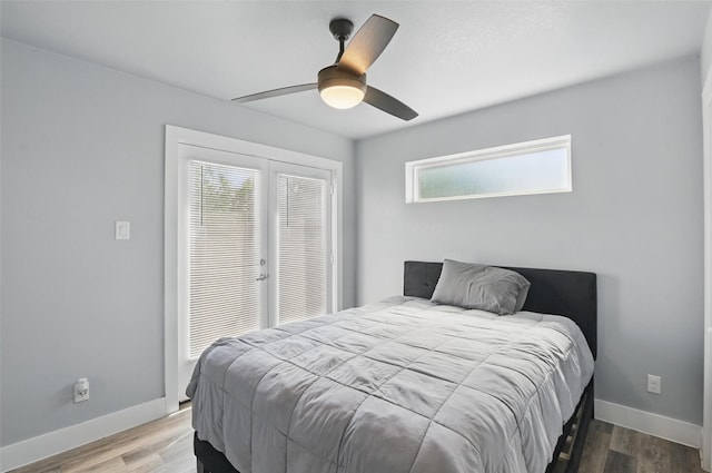 1933 Shaw St, Dallas, TX 75212 - bedroom featuring baseboards, a ceiling fan, french doors, and wood finished floors