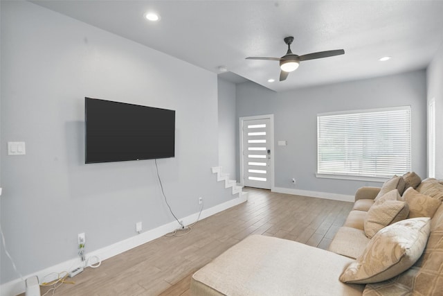 1933 Shaw St, Dallas, TX 75212 - living room featuring ceiling fan, stairs, baseboards, light wood finished floors, and recessed lighting