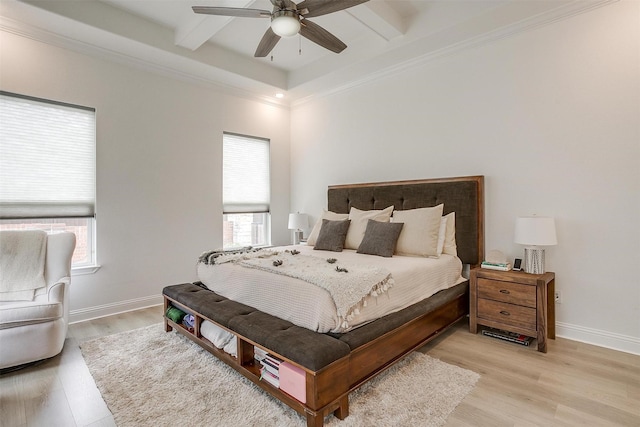 bedroom with ceiling fan, light wood-style floors, baseboards, beamed ceiling, and ornamental molding