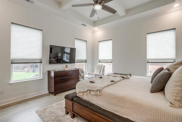 bedroom with visible vents, beamed ceiling, light wood finished floors, ornamental molding, and recessed lighting
