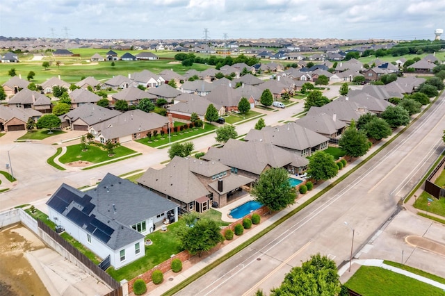 birds eye view of property with a residential view