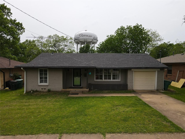 ranch-style home with a garage, concrete driveway, a front yard, and brick siding