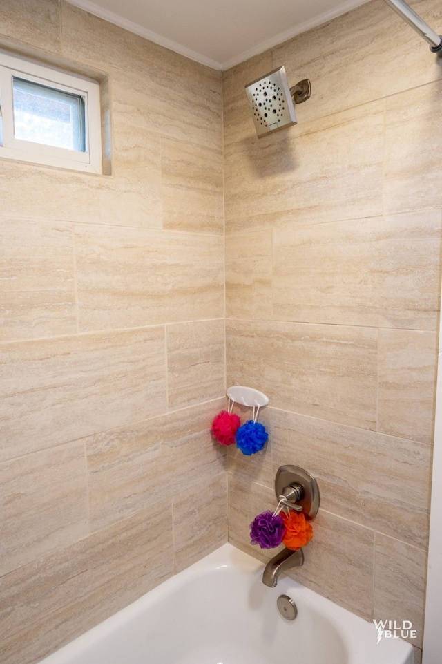 full bath featuring shower / bathing tub combination and ornamental molding