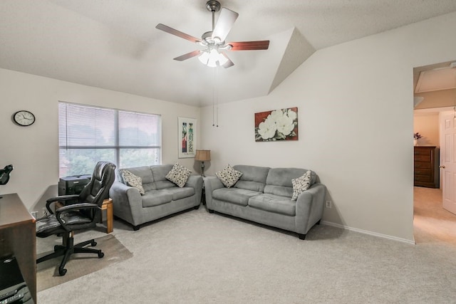 office with baseboards, light carpet, a ceiling fan, and lofted ceiling