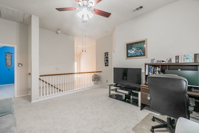 office area with carpet floors, ceiling fan, and visible vents