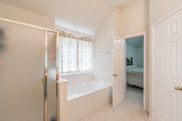 full bath with a garden tub, ensuite bathroom, vaulted ceiling, and a shower stall