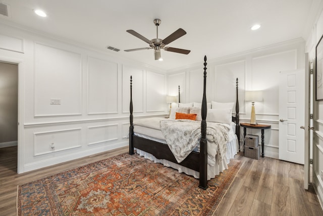920 Plaza Ln, Argyle, TX 76226 - bedroom featuring a decorative wall, wood finished floors, crown molding, recessed lighting, and ceiling fan