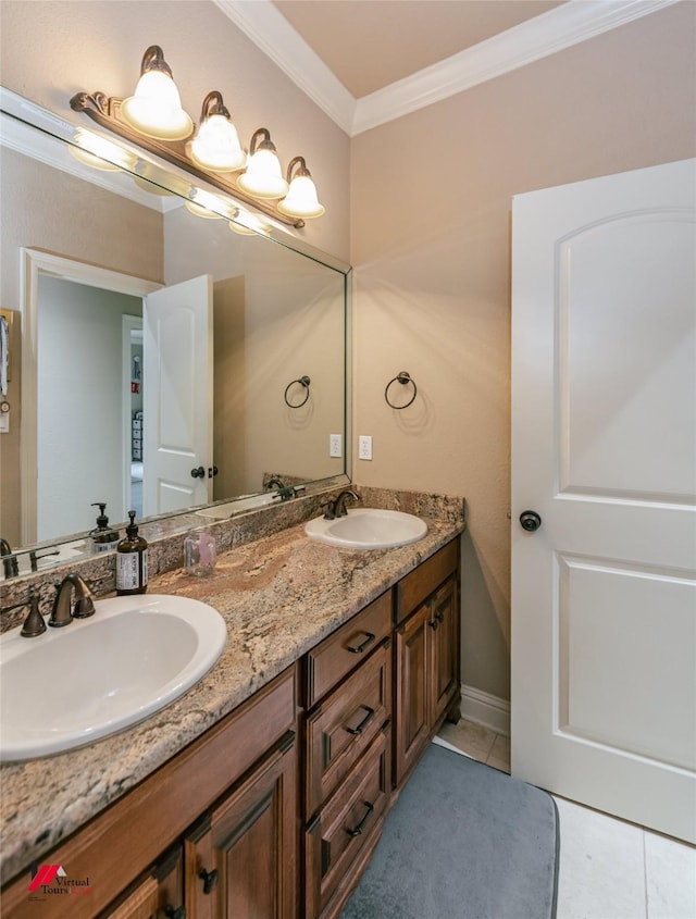 full bathroom featuring double vanity, tile patterned floors, ornamental molding, and a sink