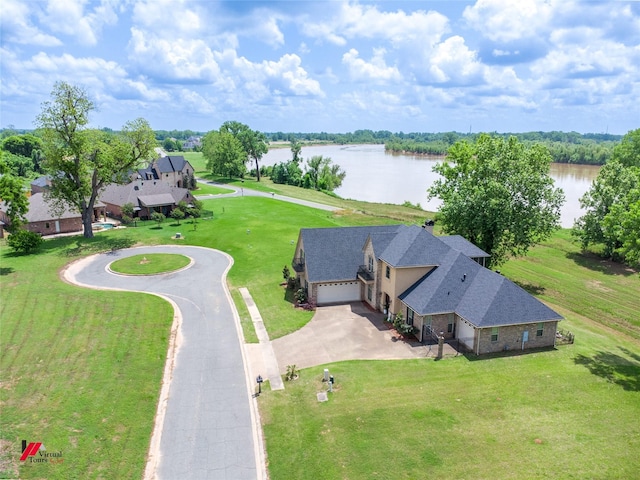 birds eye view of property featuring a water view