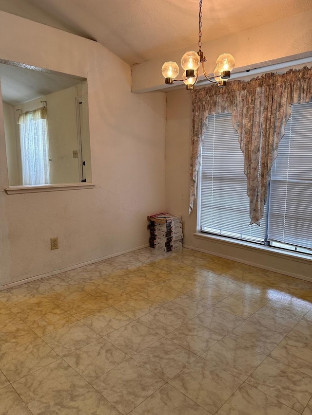 4757 China Rose Dr, Fort Worth, TX 76137 - unfurnished room featuring baseboards and a chandelier
