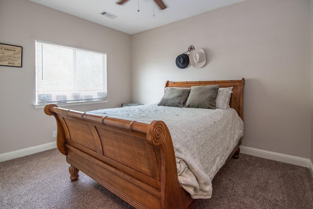 bedroom with a ceiling fan, baseboards, visible vents, and carpet