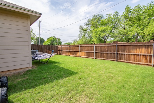 view of yard featuring a fenced backyard