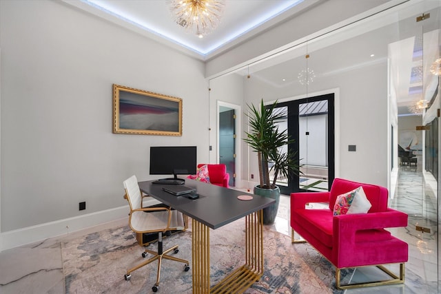 office area with an inviting chandelier, baseboards, and marble finish floor
