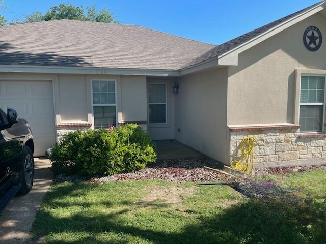 250 Ashland Dr, Woodway, TX 76712 - exterior space with stucco siding, stone siding, roof with shingles, and a garage