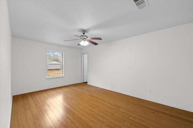 250 Ashland Dr, Woodway, TX 76712 - empty room with baseboards, a ceiling fan, wood finished floors, and visible vents