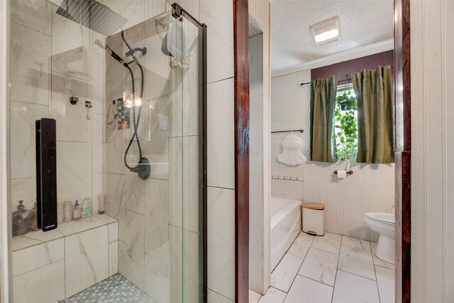 full bathroom with a textured ceiling, a stall shower, toilet, marble finish floor, and ornamental molding