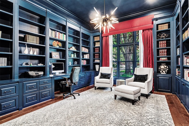 home office with crown molding, dark wood finished floors, built in shelves, built in desk, and a chandelier